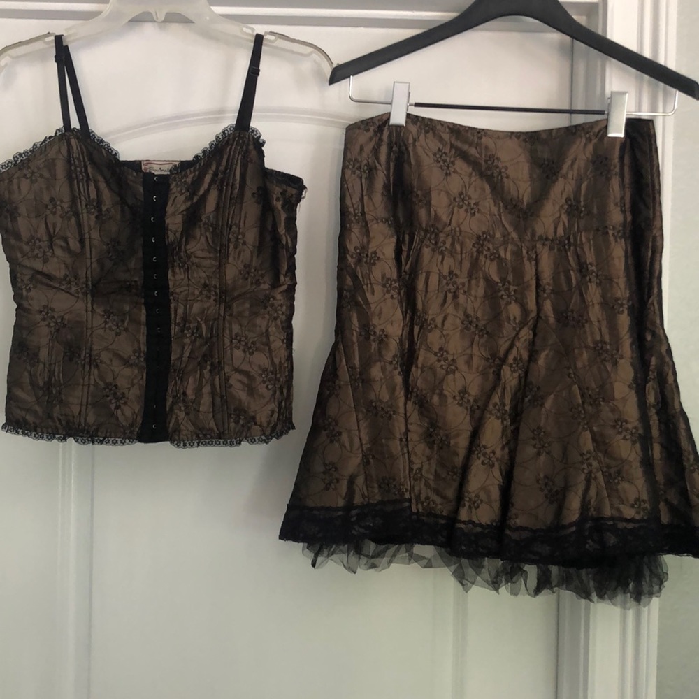 Two piece corset and skirt set.